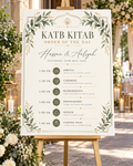 Sage Gold Katb Kitab Order of the Day displayed on an easel at a wedding venue